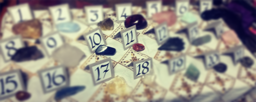Crystal Readings - crystals set up on a table with corresponding numbers